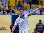 Cristiano Ronaldo gestures during a Saudi Pro League football match. Cristiano Ronaldo gestures during a Saudi Pro League football match.