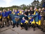 Ukrainian prisoners of war (POWs) are seen after a swap, amid Russia's attack on Ukraine, at an unknown location in Ukraine, in this handout picture released May 23, 2025.