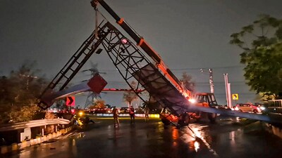 A hoarding that fell during a storm in Ghaziabad, on Wednesday. (PTI)
