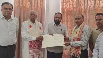 Assam minister meets with family of Vinay Narwal. (HT Photo)