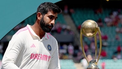 India's Jasprit Bumrah reacts as he walks past the trophy during an official ceremony after the fifth cricket Test match against Australia. (AFP) India's Jasprit Bumrah reacts as he walks past the trophy during an official ceremony after the fifth cricket Test match against Australia. (AFP)