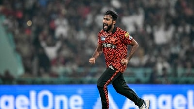 Sunrisers Hyderabad's Eshan Malinga claimed the big wickets of Royal Challengers Bengaluru's powr-hitters Romario Shepherd and Tim David to put his team on the top. (AFP) Sunrisers Hyderabad's Eshan Malinga claimed the big wickets of Royal Challengers Bengaluru's powr-hitters Romario Shepherd and Tim David to put his team on the top. (AFP)
