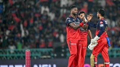 Romario Shepherd was the pick of the bowlers for RCB with two wickets in his kitty. (AFP) Romario Shepherd was the pick of the bowlers for RCB with two wickets in his kitty. (AFP)