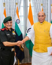 Defence minister Rajnath Singh with Chief of Defence Staff General Anil Chauhan during the latter’s book release programme in New Delhi on Thursday. (PTI)