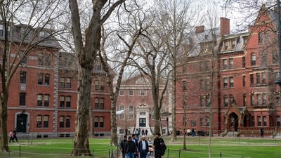 People walk through Harvard Yard on the Harvard University campus in Cambridge, Massachusetts, on April 15, 2025. (AFP File) People walk through Harvard Yard on the Harvard University campus in Cambridge, Massachusetts, on April 15, 2025. (AFP File)