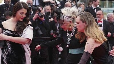 The wardrobe mishap occurred when Helen accidentally stepped on Aishwarya's cape while the two were posing alongside Cara Delevingne on the red carpet. The wardrobe mishap occurred when Helen accidentally stepped on Aishwarya's cape while the two were posing alongside Cara Delevingne on the red carpet.