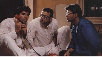 Akshay Kumar, Paresh Rawal and Suniel Shetty in a still from Hera Pheri.