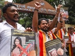 Kannada activists raise slogans during their protest against actor Tamannaah Bhatia, who has been chosen as brand ambassador for Karnataka Soaps and Detergents Ltd. (KSDL), which manufactures Mysore Sandal Soap. Kannada activists raise slogans during their protest against actor Tamannaah Bhatia, who has been chosen as brand ambassador for Karnataka Soaps and Detergents Ltd. (KSDL), which manufactures Mysore Sandal Soap.
