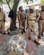 Police officials at the encounter spot in Amritsar on Friday. (Sameer Sehgal/HT) Police officials at the encounter spot in Amritsar on Friday. (Sameer Sehgal/HT)