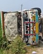 The vehicle overturned by mob near Alhadadpur village within Harduaganj police station limits in Aligarh. (HT Photo)