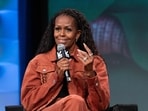 Former US First Lady Michelle Obama sparked divorce rumors with her 'flirty' conversation with a billionaire 