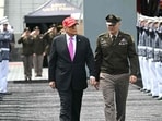 Donald Trump walks next to US Military Academy Superintendent Lt. Gen. Steven Gilland depart after delivering the commencement address at the 2025 graduation ceremony at the US Military Academy West Point on May 24, 2025, in West Point, New York. (Photo by SAUL LOEB / AFP)