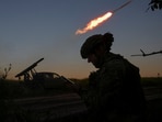 Members of the National Police Special Purpose Battalion of Zaporizhzhia region fire a Partizan multiple rocket launcher towards Russian troops on a front line.