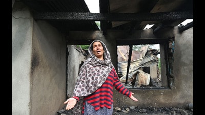 A woman cries as she stands outside her house damaged by Pakistani artillery shelling, at Salamabad village in Uri ,north of Srinagar (Waseem Andrabi /Hindustan Times) A woman cries as she stands outside her house damaged by Pakistani artillery shelling, at Salamabad village in Uri ,north of Srinagar (Waseem Andrabi /Hindustan Times)