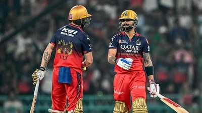 Royal Challengers Bengaluru's Virat Kohli (R) speaks with his teammate Phil Salt during the Indian Premier League (IPL) Twenty20 cricket match between Royal Challengers Bengaluru and Sunrisers Hyderabad (AFP) Royal Challengers Bengaluru's Virat Kohli (R) speaks with his teammate Phil Salt during the Indian Premier League (IPL) Twenty20 cricket match between Royal Challengers Bengaluru and Sunrisers Hyderabad (AFP)