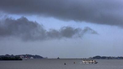 Dark clouds cover the skyline, in Kochi of Ernakilam district in Kerala on Saturday. (PTI) Dark clouds cover the skyline, in Kochi of Ernakilam district in Kerala on Saturday. (PTI)