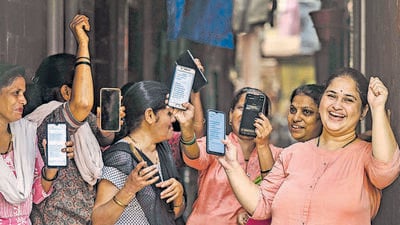 Mumbai, India - Aug. 16, 2024: Women expressing their happiness over the deposit of ?3000 in women's accounts under the Maharashtra Government's Ladki Bahin Yojana in Mumbai, India, on Friday, August 16, 2024. (Photo by Satish Bate/ Hindustan Times) (Hindustan Times) Mumbai, India - Aug. 16, 2024: Women expressing their happiness over the deposit of ?3000 in women's accounts under the Maharashtra Government's Ladki Bahin Yojana in Mumbai, India, on Friday, August 16, 2024. (Photo by Satish Bate/ Hindustan Times) (Hindustan Times)