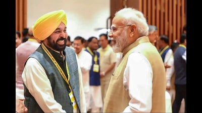 Prime Minister Narendra Modi with Punjab CM Bhagwant Mann at the meeting of the 10th governing council of the Niti Aayog in New Delhi. (PTI) Prime Minister Narendra Modi with Punjab CM Bhagwant Mann at the meeting of the 10th governing council of the Niti Aayog in New Delhi. (PTI)