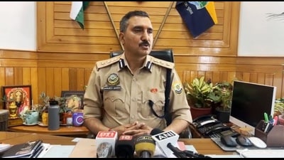 Shimla superintendent of police (SP) Sanjeev Gandhi during a press conference at his office in Shimla on Saturday. (HT Photo)