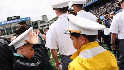 Children collect the hats of the graduating class of the United States Military Academy celebrate at the conclusion of their graduation ceremony at West Point in Michie Stadium on May 24, 2025 in West Point, New York. (Getty Images via AFP) Children collect the hats of the graduating class of the United States Military Academy celebrate at the conclusion of their graduation ceremony at West Point in Michie Stadium on May 24, 2025 in West Point, New York. (Getty Images via AFP)