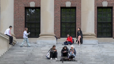 Students gather on the campus of Harvard University in Cambridge, Massachusetts, U.S., May 23, 2025. (REUTERS)