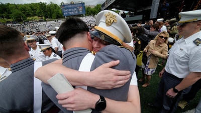 Cadets hug each other during the commencement ceremony at West Point Military Academy in West Point, New York, U.S., May 24, 2025. REUTERS/Eduardo Munoz (REUTERS)