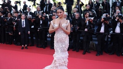 Alia Bhatt opted for a beige Schiaparelli gown for her debut at the Cannes Film Festival. (Photo by Sameer AL-DOUMY / AFP) (AFP) Alia Bhatt opted for a beige Schiaparelli gown for her debut at the Cannes Film Festival. (Photo by Sameer AL-DOUMY / AFP) (AFP)