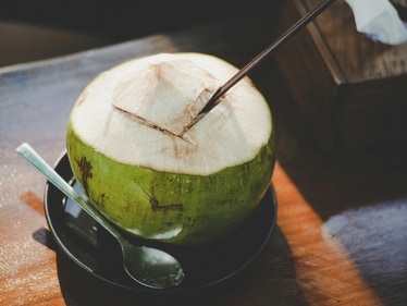 Coconut water cools down the body. (Pexels)