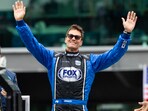 Tom Brady waves to the booing crowd prior to the IndyCar Series 109th Running of the Indianapolis 500 at Indianapolis Motor Speedway.