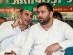 RJD Tejashwi Yadav (Right) and Tej Pratap Yadav during a rally in Patna on May 3. RJD Tejashwi Yadav (Right) and Tej Pratap Yadav during a rally in Patna on May 3.