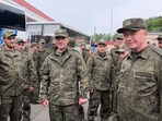 A still image from a video released by Russia's Defence Ministry shows Deputy Defence Minister Alexander Fomin meeting with Russian service personnel, who were said to be captured by Ukrainian forces and released on the third day of the latest exchange of prisoners of war in the course of Russia-Ukraine conflict, at an unknown location in Belarus, in this image taken from handout footage released May 25, 2025. 