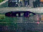 A vehicle is seen submerged at Minto Road in Delhi on Sunday after heavy rainfall. A vehicle is seen submerged at Minto Road in Delhi on Sunday after heavy rainfall.