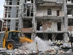 A local resident stands in a damaged flat of a multistory residential building following a drone strike in Kyiv on May 25, 2025, amid Russian invasion in Ukraine. A local resident stands in a damaged flat of a multistory residential building following a drone strike in Kyiv on May 25, 2025, amid Russian invasion in Ukraine.
