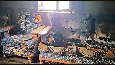 A burnt sofa at the Congress party office on Sunday. (HT Photo) A burnt sofa at the Congress party office on Sunday. (HT Photo)