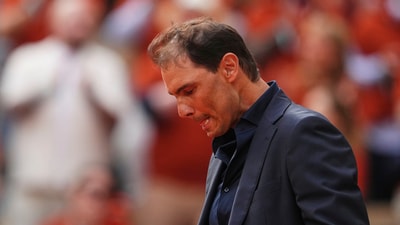 Rafa Nadal is overwhelmed with emotion during a farewell ceremony at center court Philippe-Chatrier, at the Roland-Garros stadium (AP)