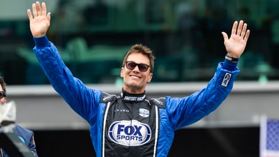 Tom Brady waves to the booing crowd prior to the IndyCar Series 109th Running of the Indianapolis 500 at Indianapolis Motor Speedway. (IMAGN IMAGES via Reuters)