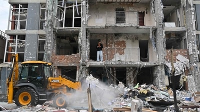 A local resident stands in a damaged flat of a multistory residential building following a drone strike in Kyiv on May 25, 2025, amid Russian invasion in Ukraine. (AFP) A local resident stands in a damaged flat of a multistory residential building following a drone strike in Kyiv on May 25, 2025, amid Russian invasion in Ukraine. (AFP)