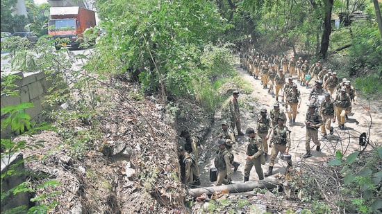 Soldiers use the culvert under the Ring Road near Dhaula Kaun to go from their parade ground to the barracks on May 16. (Vipin Kumar/HT Photo)