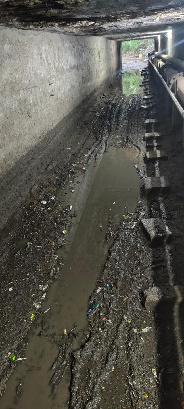 Inside the culvert after rainfall on Sunday. Locals said that the culvert was flooded again on Sunday morning after heavy rains in the area, disturbing the morning training session of the soldiers. The water drained out only by early afternoon. (HT Photo)