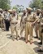 Amritsar police commissioner Gurpreet Singh Bhullar with other personnel at the encounter site on Monday. (Sameer Sehgal/HT) Amritsar police commissioner Gurpreet Singh Bhullar with other personnel at the encounter site on Monday. (Sameer Sehgal/HT)