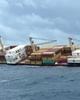 Liberian-flagged container ship sank off the Kerala coast (AFP) Liberian-flagged container ship sank off the Kerala coast (AFP)