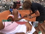 Naomi Osaka arrived at the court wearing a cute pink outfit with a sakura theme, which included flower hair clips and a frilly skirt.
