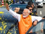 Prime Minister Narendra Modi waves at supporters during a roadshow in Vadodara, Gujarat, Monday Prime Minister Narendra Modi waves at supporters during a roadshow in Vadodara, Gujarat, Monday