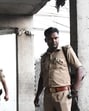 Police personnel at the crime scene in Lucknow on Sunday. (HT Photo) Police personnel at the crime scene in Lucknow on Sunday. (HT Photo)