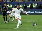 Al Nassr's Cristiano Ronaldo scores their second goal from the penalty spot.
