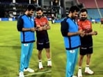 LSG mentor Zaheer Khan showed pictures of his newborn son Fatehsinh to RCB batter Virat Kohli LSG mentor Zaheer Khan showed pictures of his newborn son Fatehsinh to RCB batter Virat Kohli