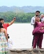 Visitors enjoying the pleasant weather following overnight light rain at Sukhna Lake in Chandigarh on Sunday. (Keshav Singht/HT) Visitors enjoying the pleasant weather following overnight light rain at Sukhna Lake in Chandigarh on Sunday. (Keshav Singht/HT)