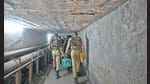 the soldiers are forced to take a path straddling a stench-filled drain under a culvert on a busy stretch of the Ring Road (HT Photo)