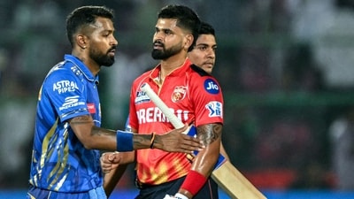 Punjab Kings humbled Mumbai Indians by seven wickets in their Indian Premier League match on Monday to ensure a top-two finish in the playoffs. (AFP) Punjab Kings humbled Mumbai Indians by seven wickets in their Indian Premier League match on Monday to ensure a top-two finish in the playoffs. (AFP)
