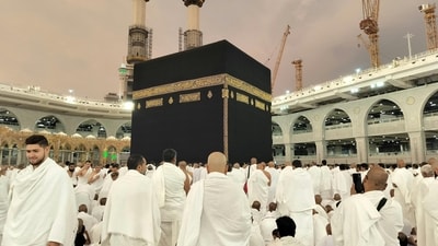 Muslims in white robes pray around the Kaaba, Islam's holiest shrine, at the Grand Mosque in Saudi Arabia's holy city of Mecca. Know the date and all about the annual hajj pilgrimage here. (Image by Pexels) Muslims in white robes pray around the Kaaba, Islam's holiest shrine, at the Grand Mosque in Saudi Arabia's holy city of Mecca. Know the date and all about the annual hajj pilgrimage here. (Image by Pexels)